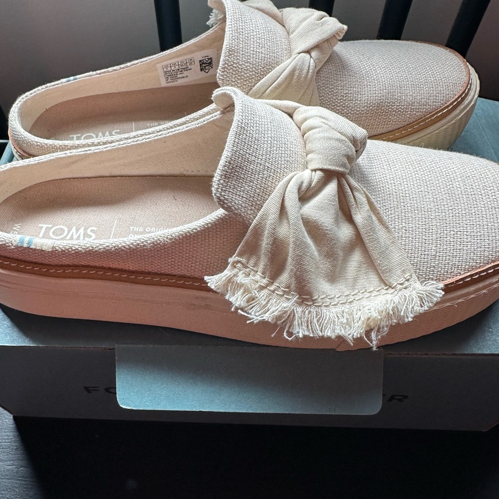 Toms Cream Mules with Tassel Detail